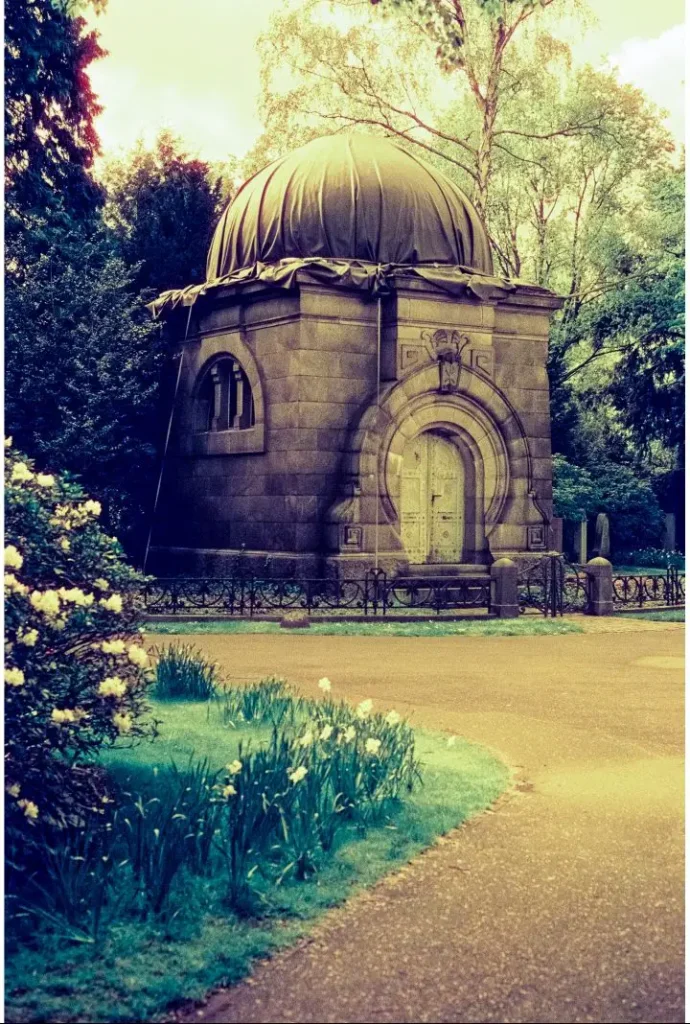 mausoleum at the Engesohde cemetery in Hannover, shot on CineStill 800t film with an orange filter