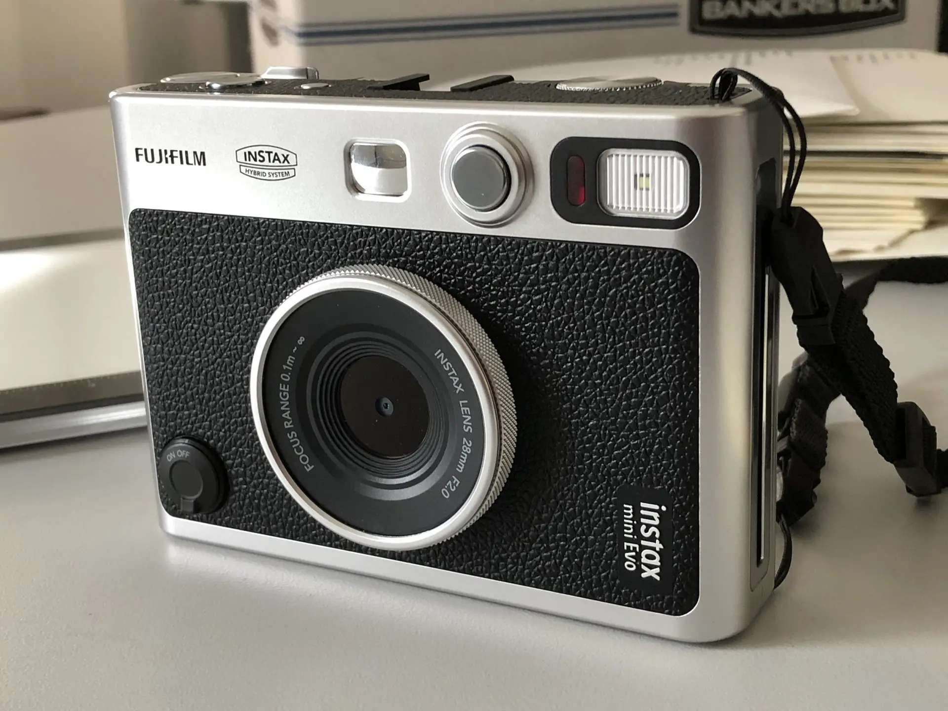 Fujifilm's new Instax Mini Evo Hybrid is an instant camera with 10  integrated lenses and 10 film effects: Digital Photography Review