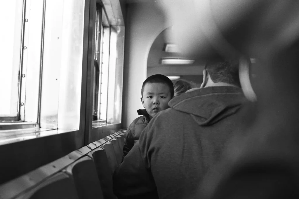 Kid in the ferry - New York (2016) - Leica M6 - 35mm compact camera