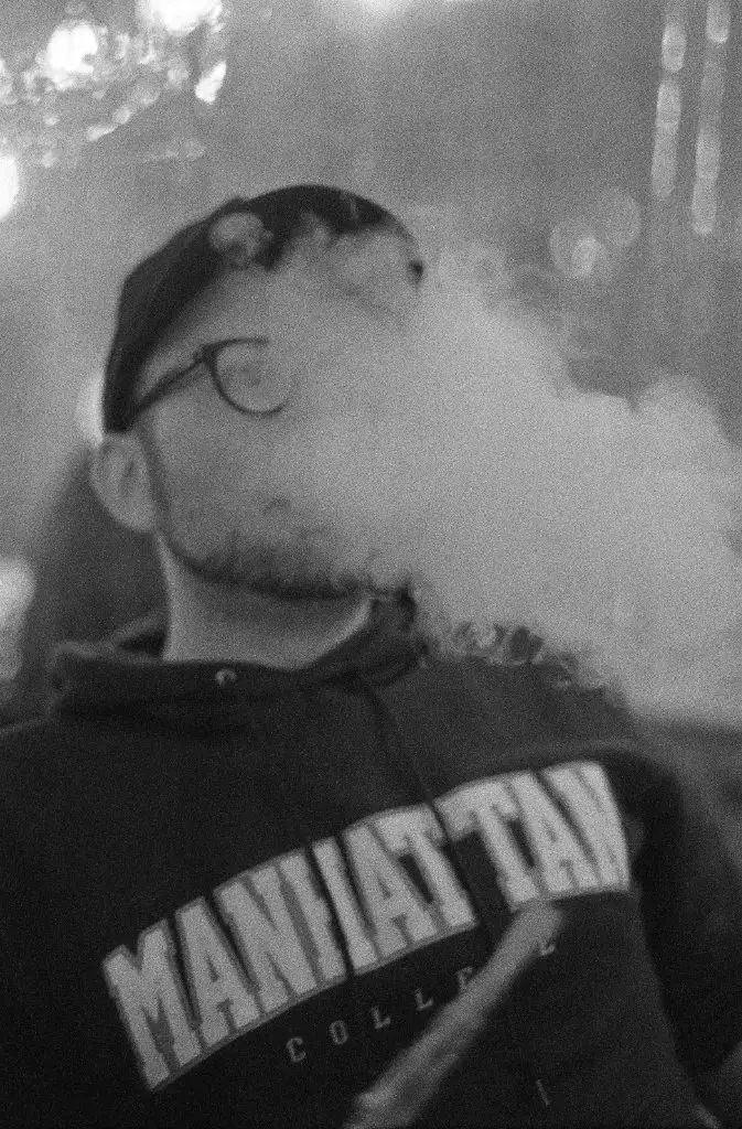 Hookah Smoke Portrait taken a Minolta SRT 100 with Ilford Delta 3200