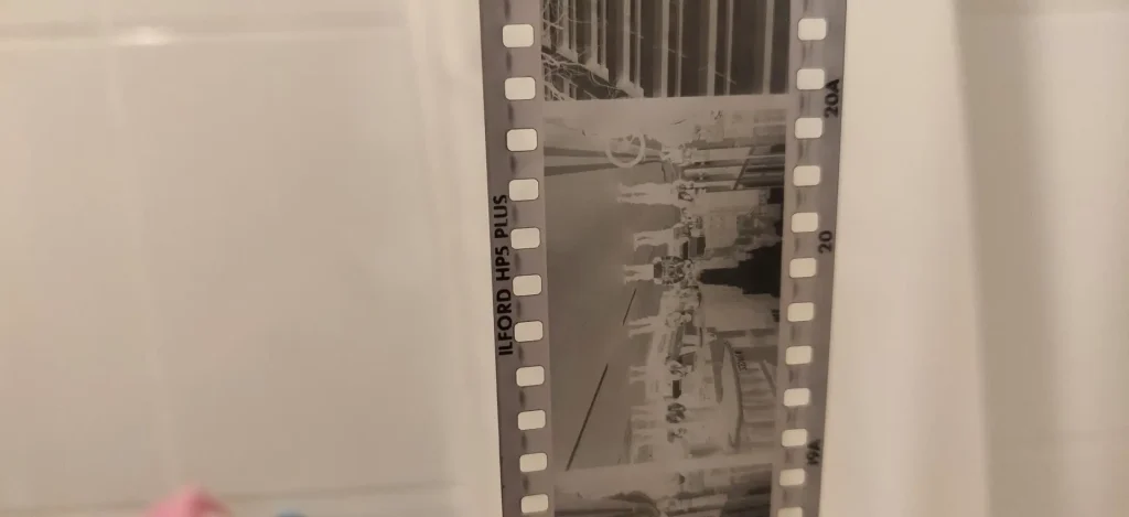 A black and white film negative, showing contrast and density.