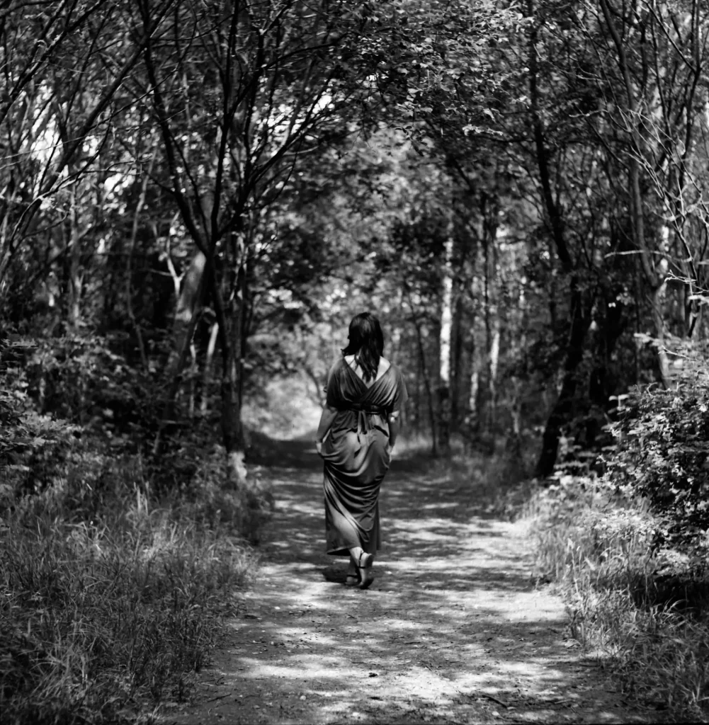 Woman Walking Away From The Camera