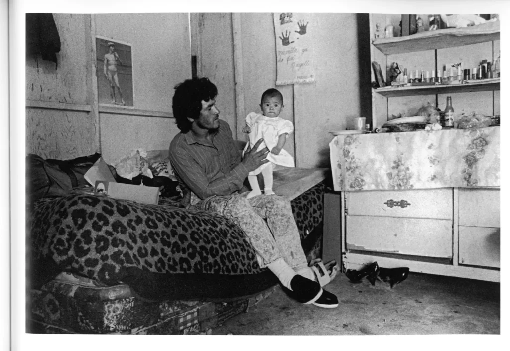 Young Man and Infant in Home