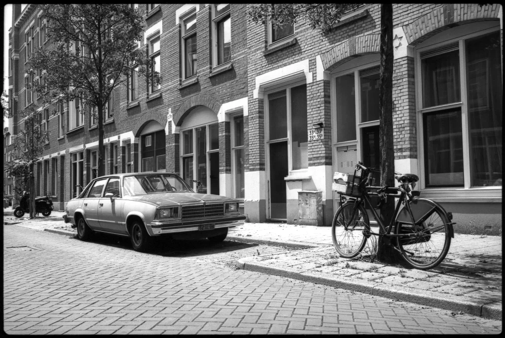 A vintage American car on an old street in Rotterdam