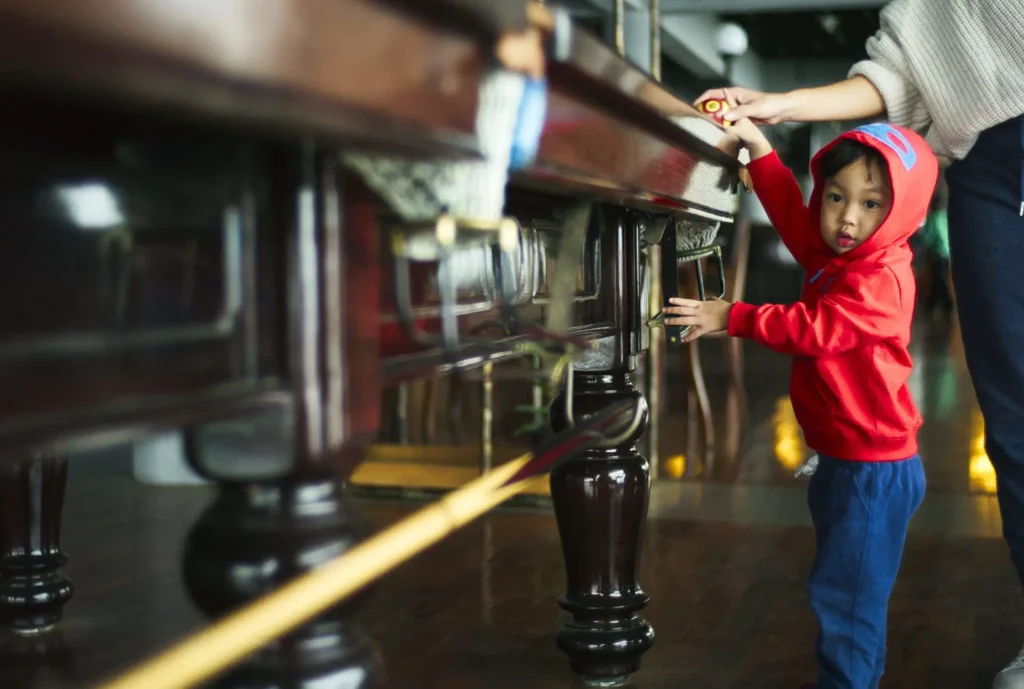 kid and pool table