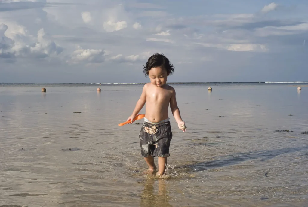 kid on the beach