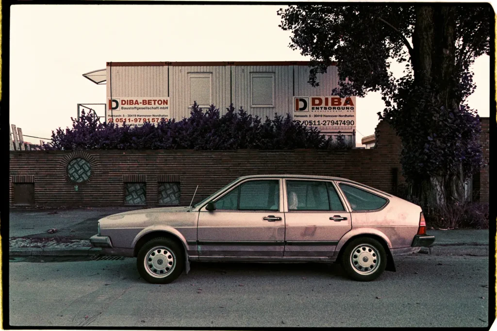 Volkswagen Passat from the 1980s shot on Lomography Purple film.