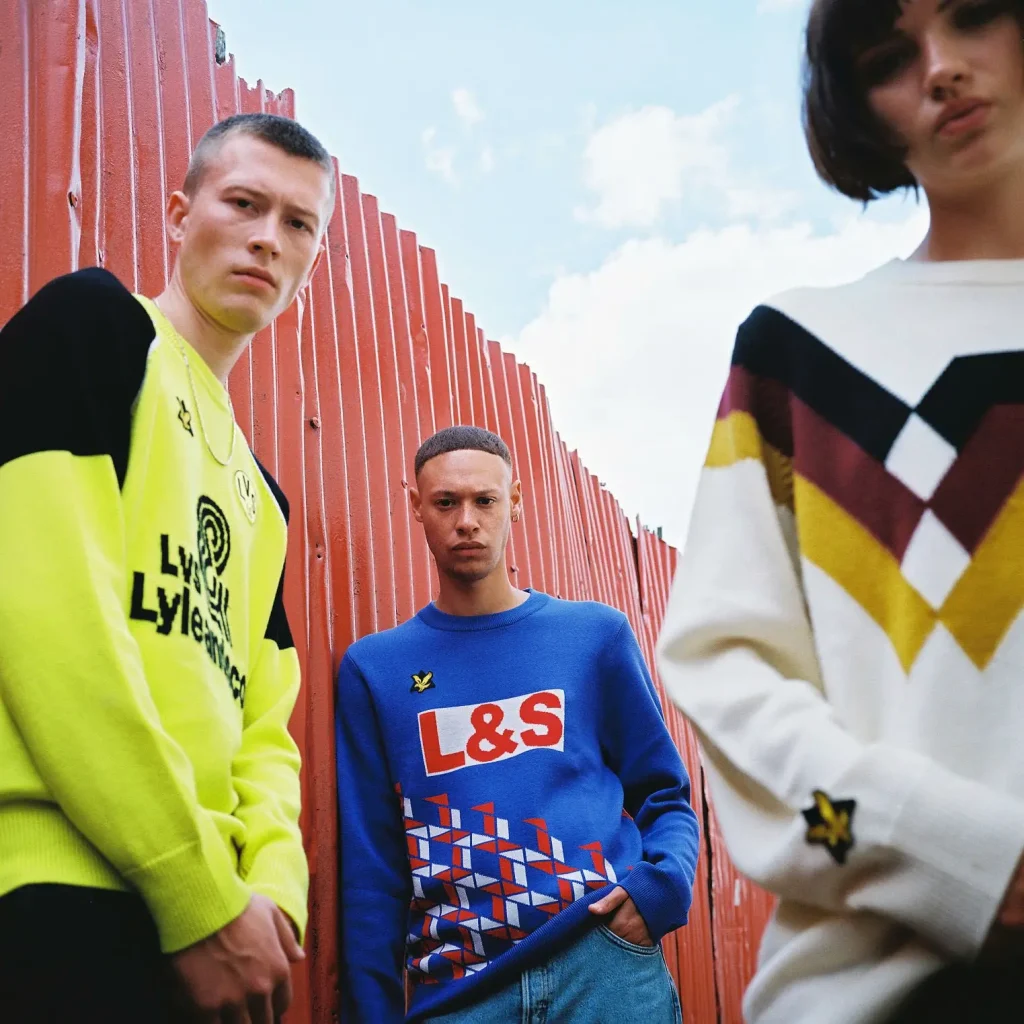 Three young models wear Neal Heard Jumpers