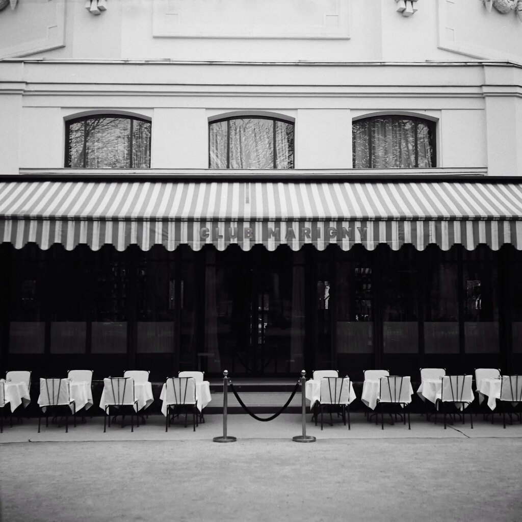 paris restaurant in black and white film