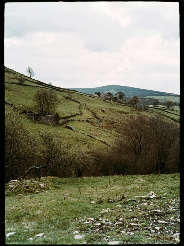 Old English farm and abandoned building.