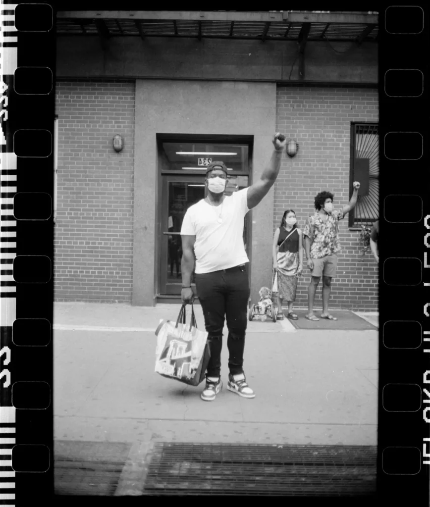 Man came out of his building to hold up a fist