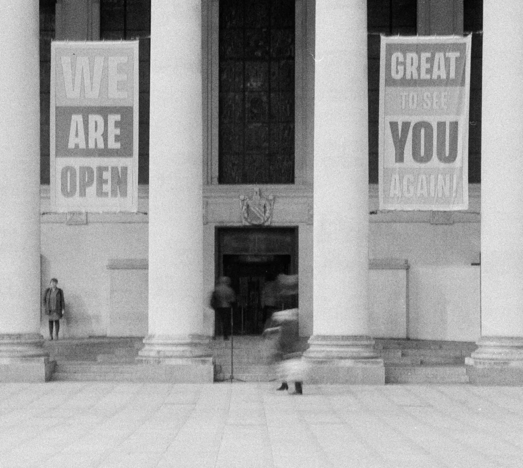 Post-lockdown banners welcoming people to Manchester Central Library