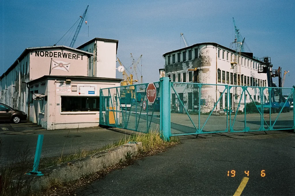Two almost derelict buildings of a shipyard located in Hamburg, captured with a point-and-shoot camera.