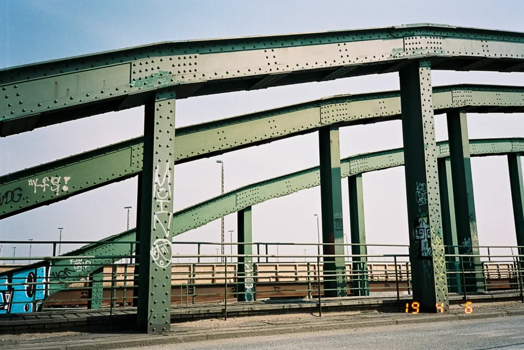 Three arches of a brigde made of steel.