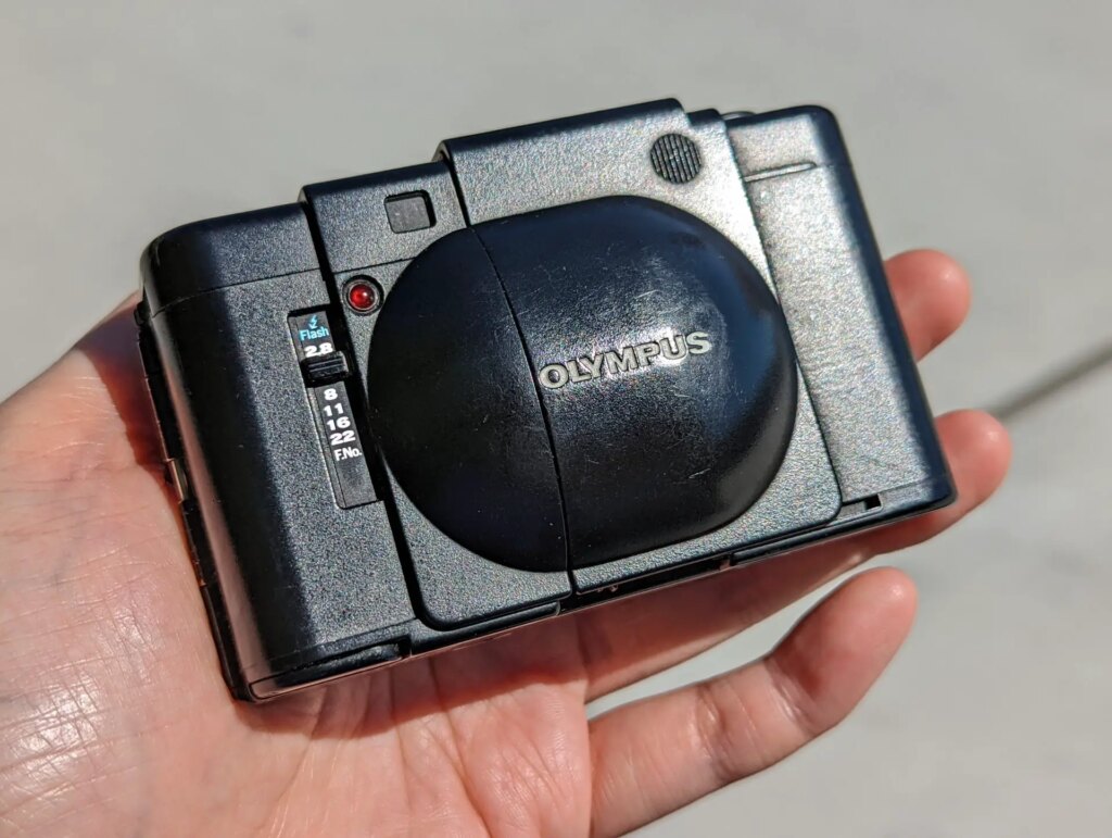 A picture of an Olympus XA film camera to show its condition.