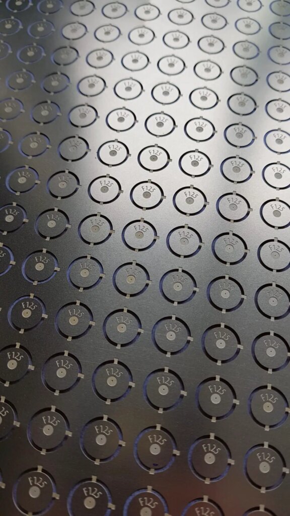 A sheet of manufactured pinhole lenses