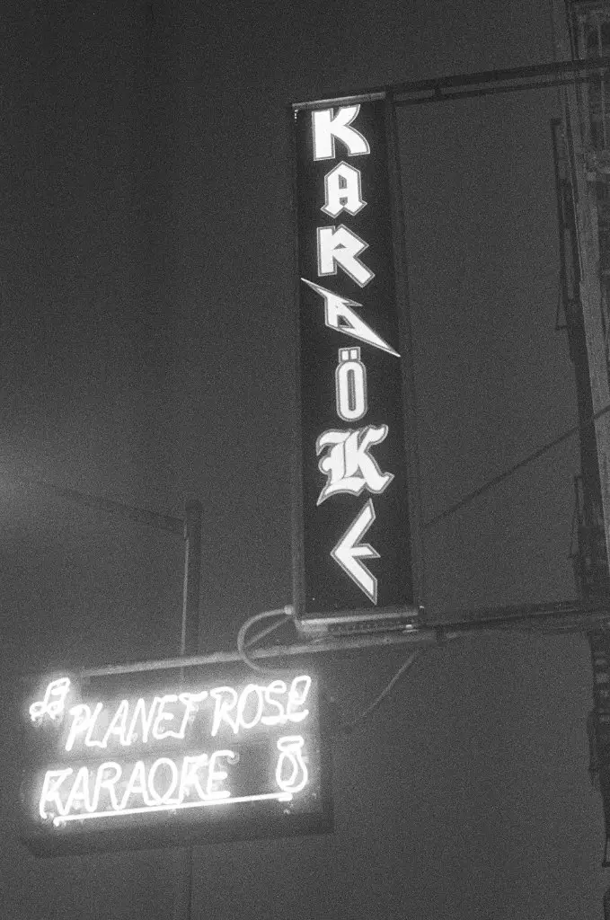 Neon Karaoke Sign Taken in the East Village With a Minolta SRT 100 with Ilford Delta 3200