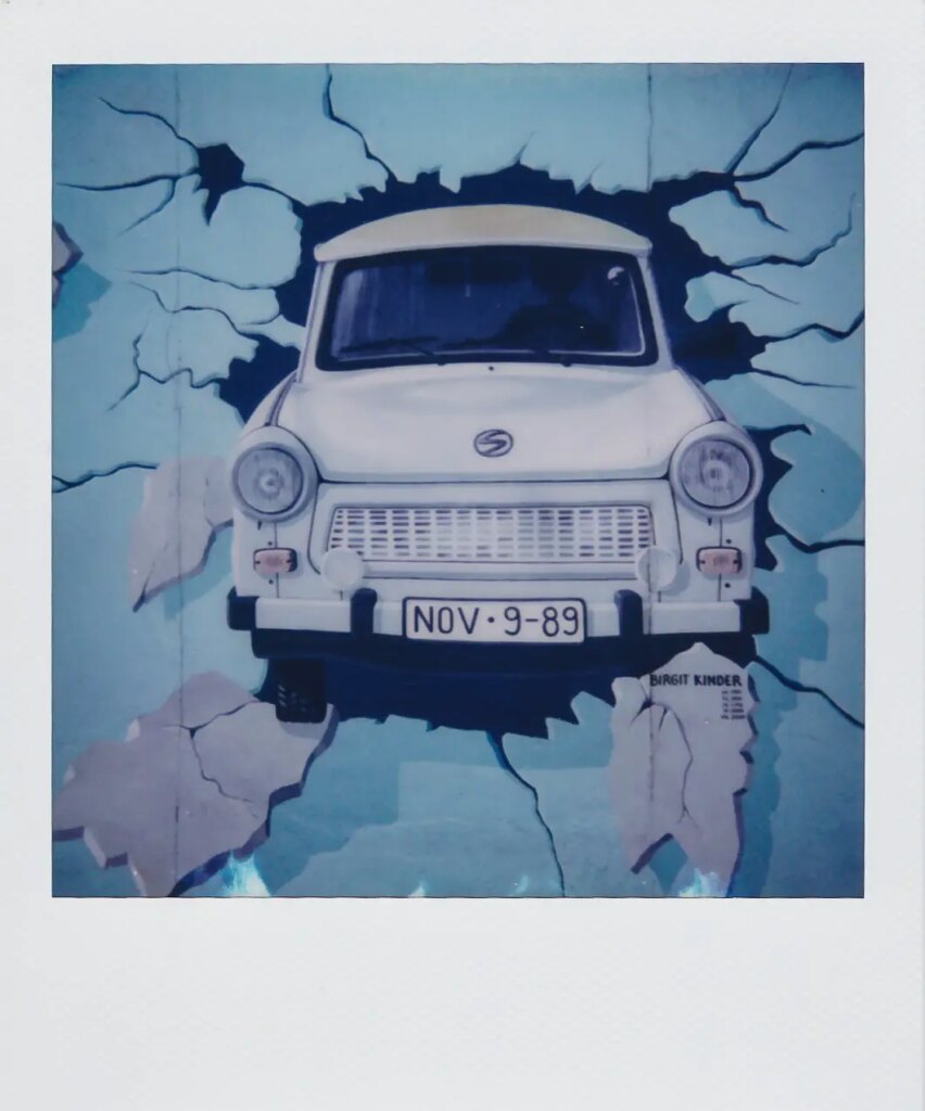 A polaroid of a Trabi in the East Side Gallery, Berlin