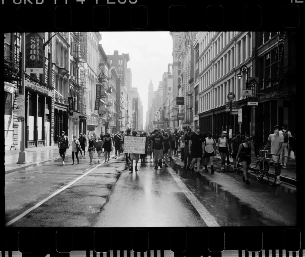 Huge crowd walking up Broadway