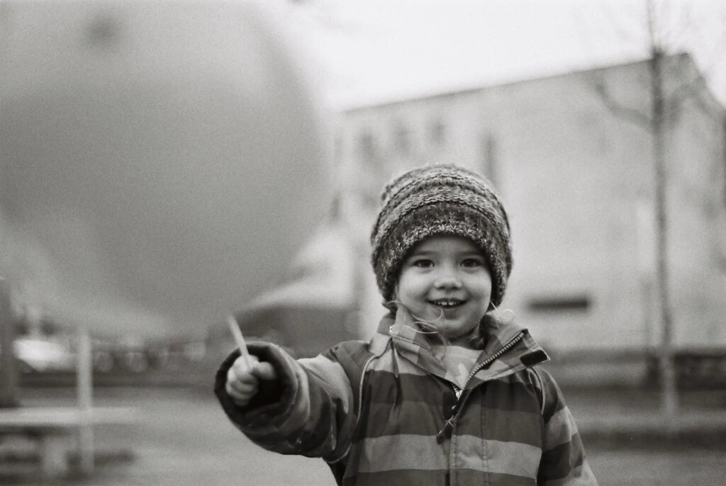 My daughter holding a balloon