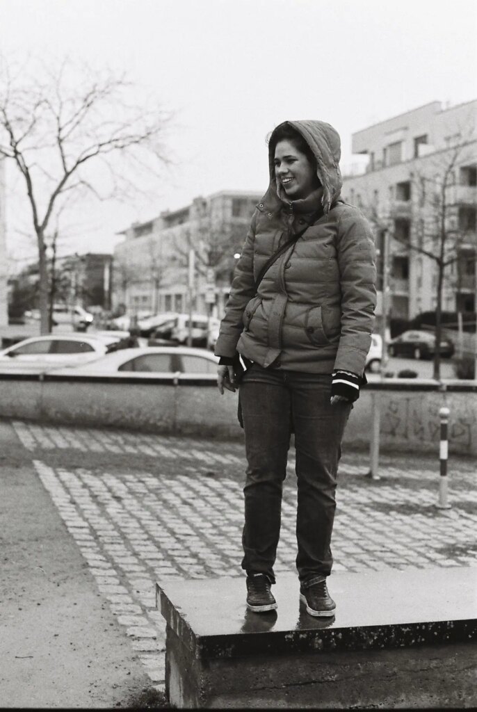 My Wife standing on a Bench