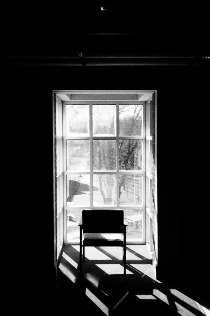 A chair facing a windowsill