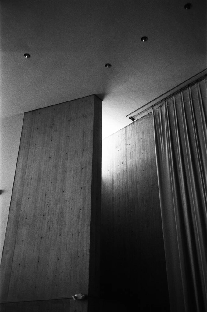 Light coming through a far away window in a concert hall