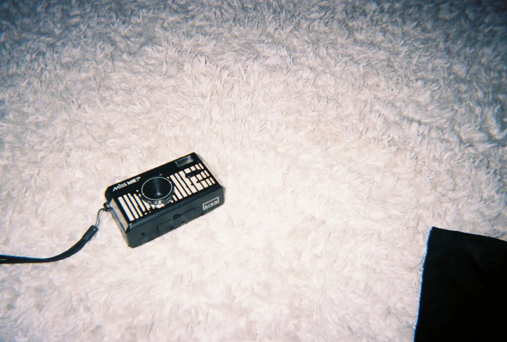 image of small camera on carpet floor taken with AURA camera