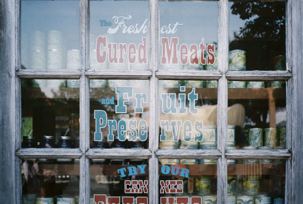 image of store window of cured meats