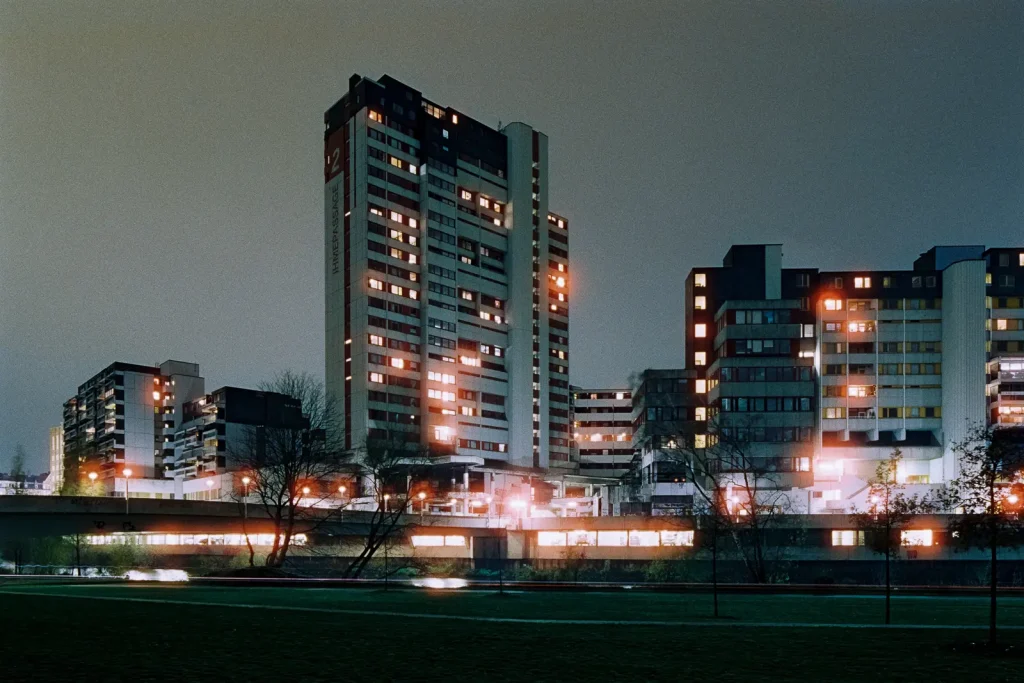 high-rises of "Ihme-Zentrum" housing complex in Hanover, shot at night on CineStill film