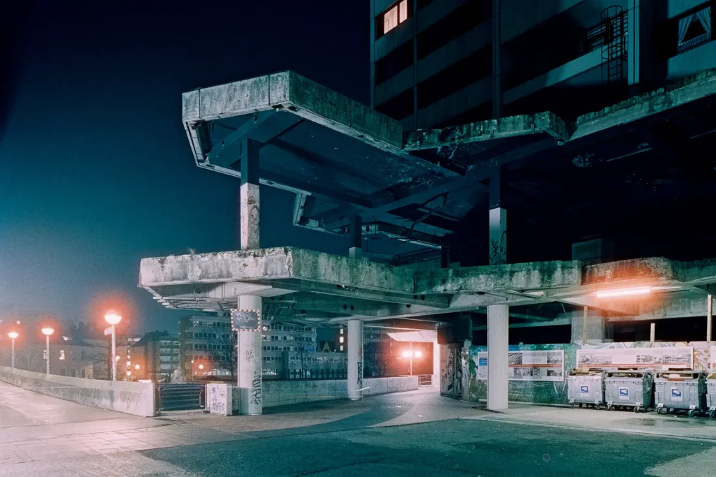 demolished facade of "Ihme-Zentrum" housing complex in Hanover, shot at night on CineStill film