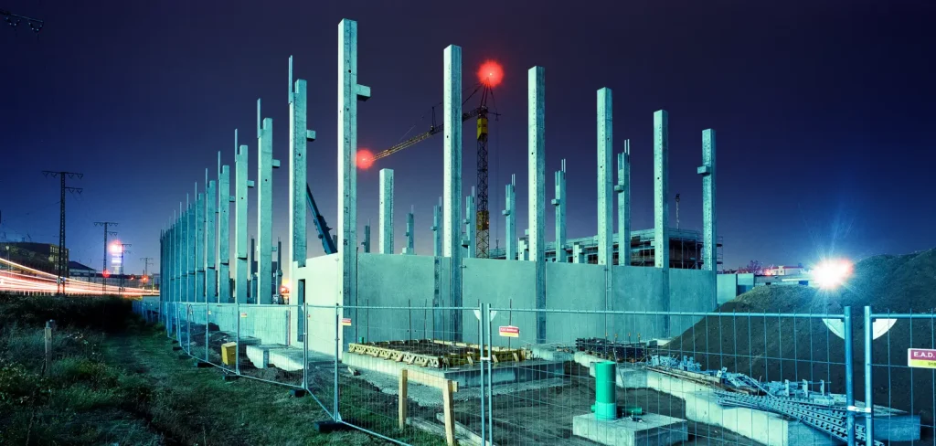 shell construction of a warehouse shot at night on CineStill film
