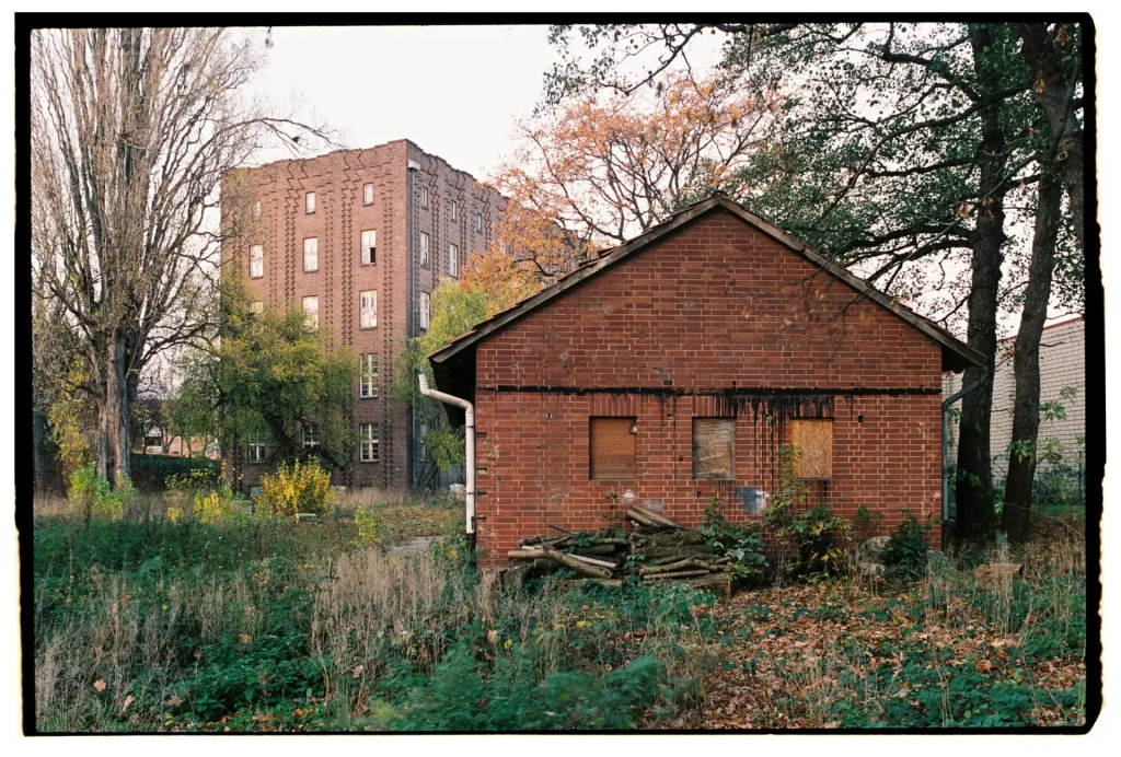 two old brick buildings shot on Fuji Superia 400 film