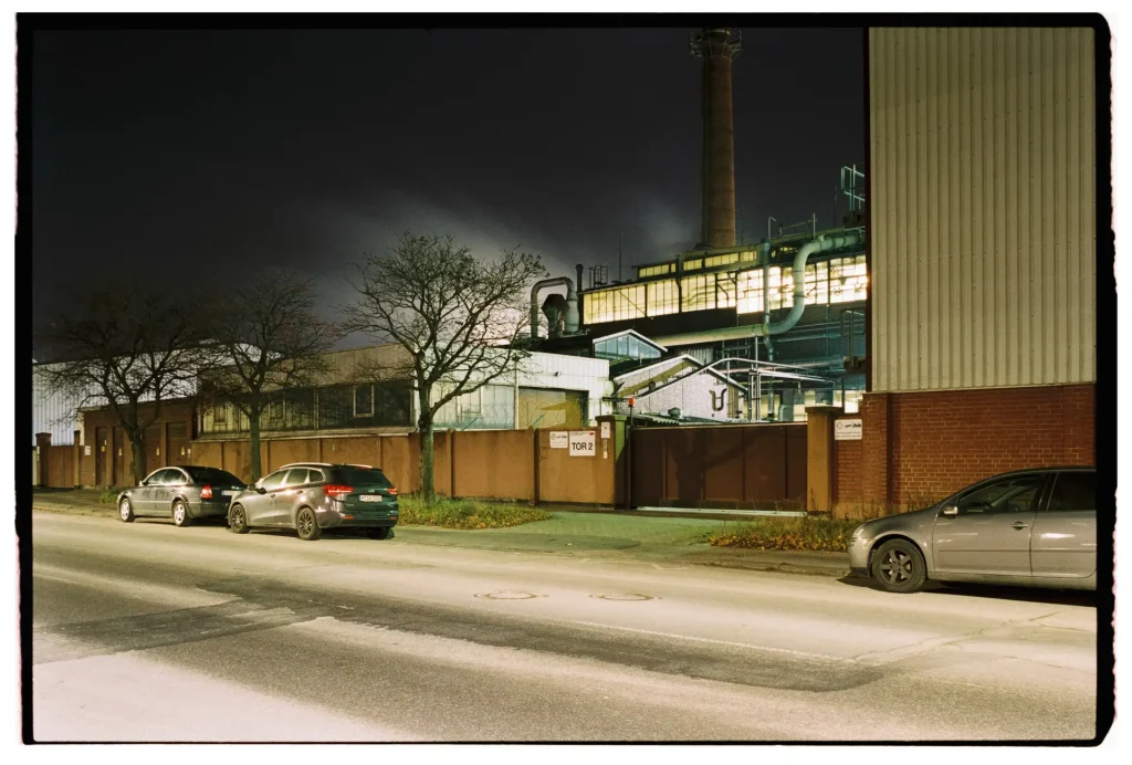 a factory at night, shot on Fuji Superia 400 film