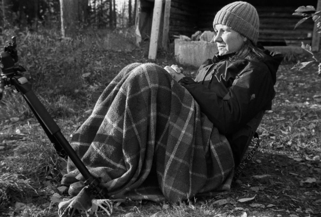 Woman outdoors with a blanket