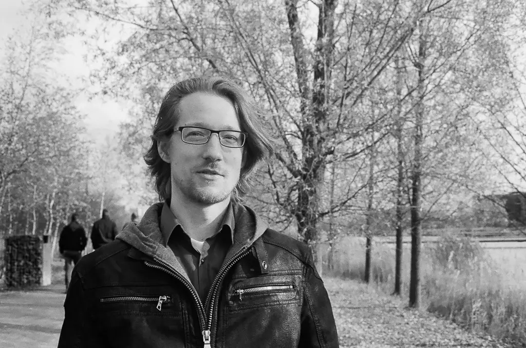 Portraits of co-workers in different light conditions.