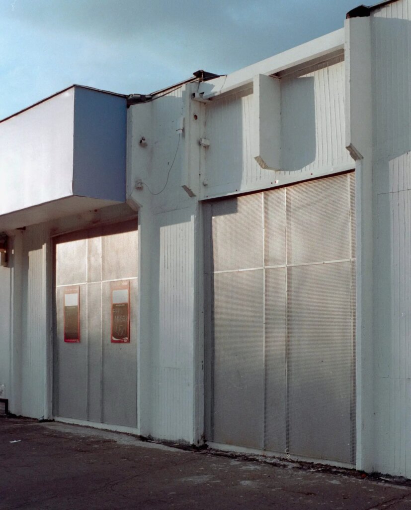 backdoor of a grocery shop at sunset