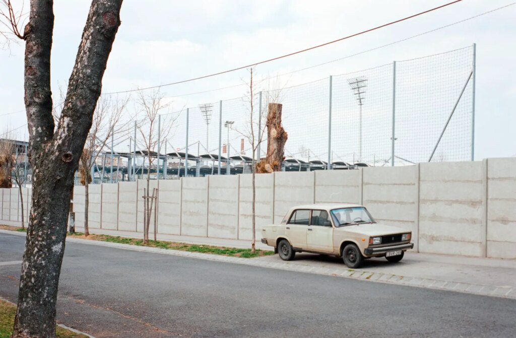 old Lada by a concrete wall