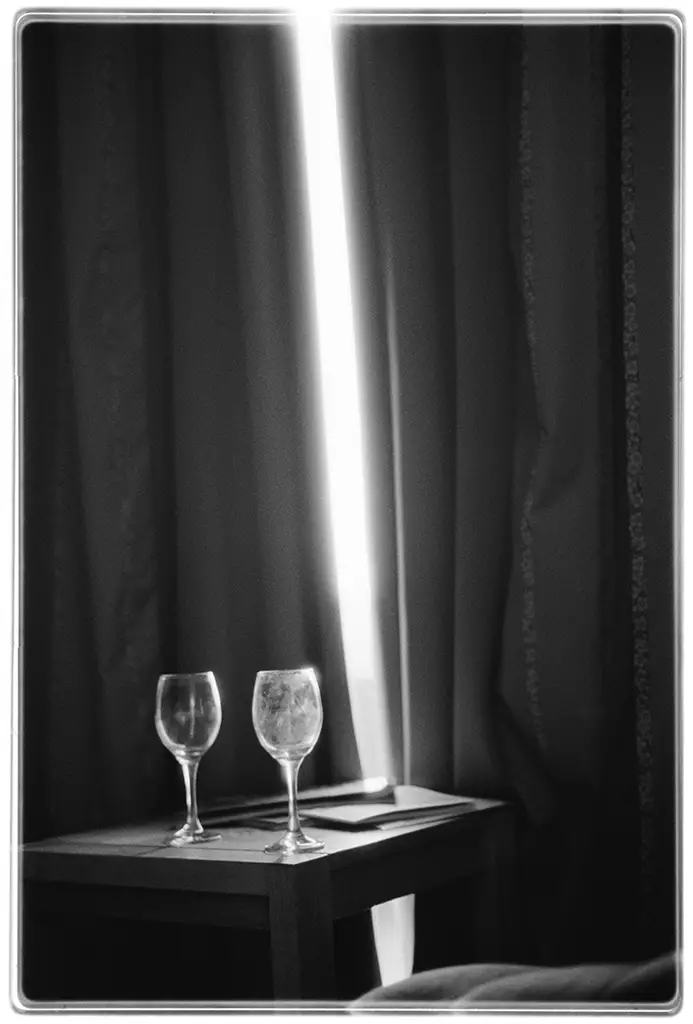 Wine glasses and curtains