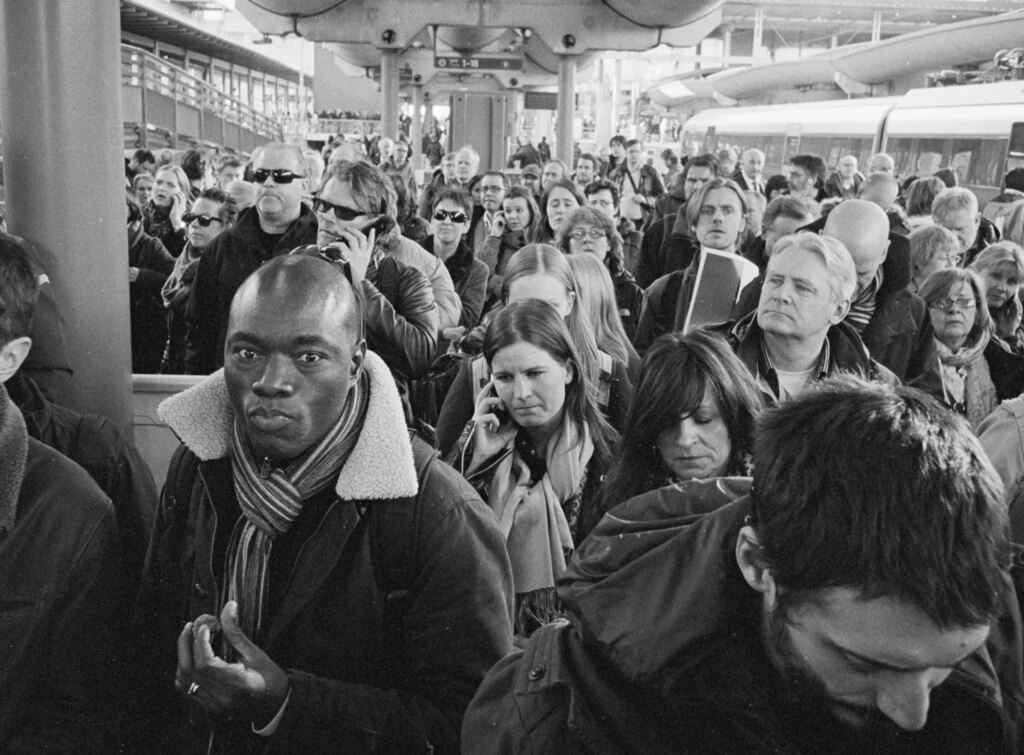 Line of waiting train passengers