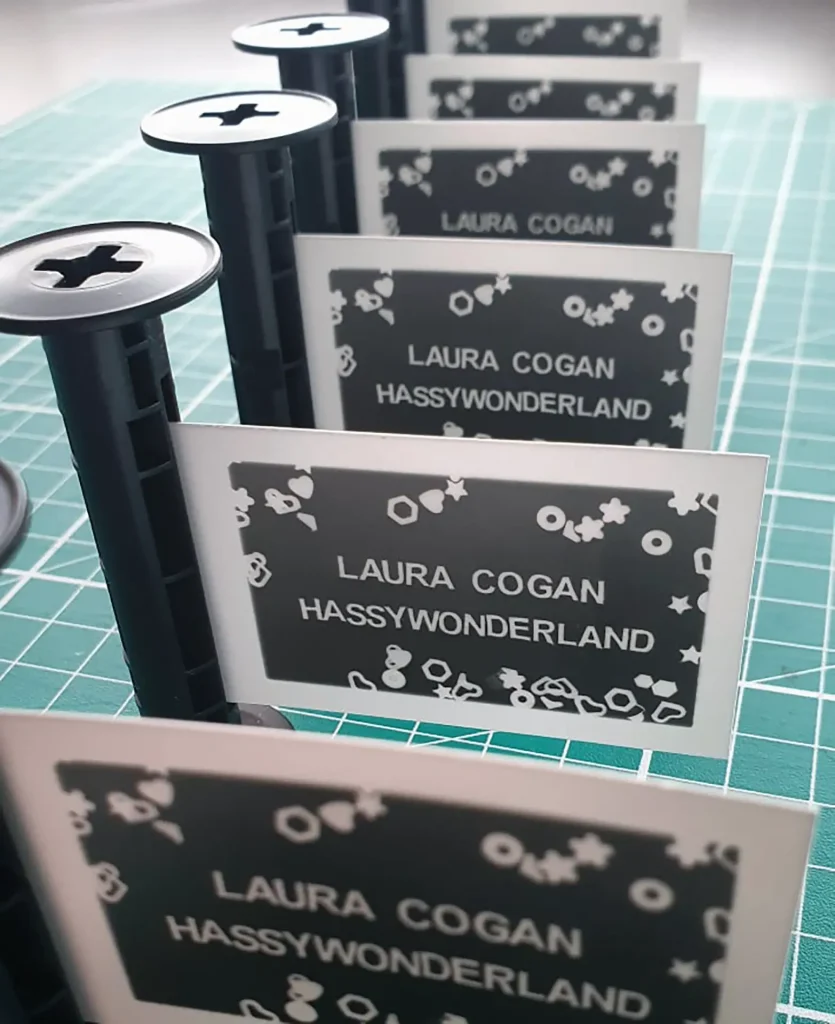 Laura Cogan Hassy Wonderland business cards