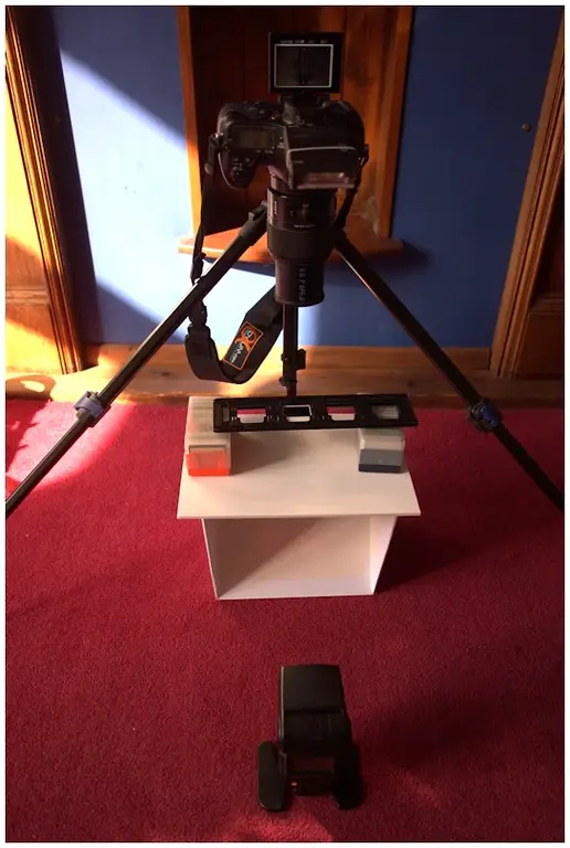 camera on tripod for copying slides