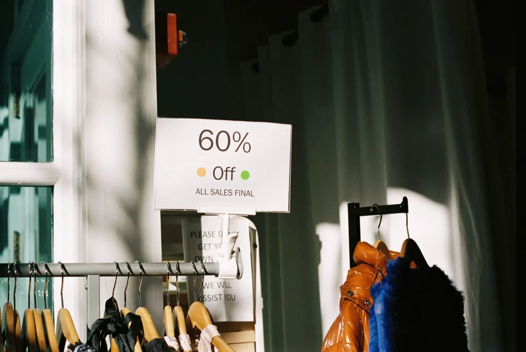A 60% off sign in a boutique