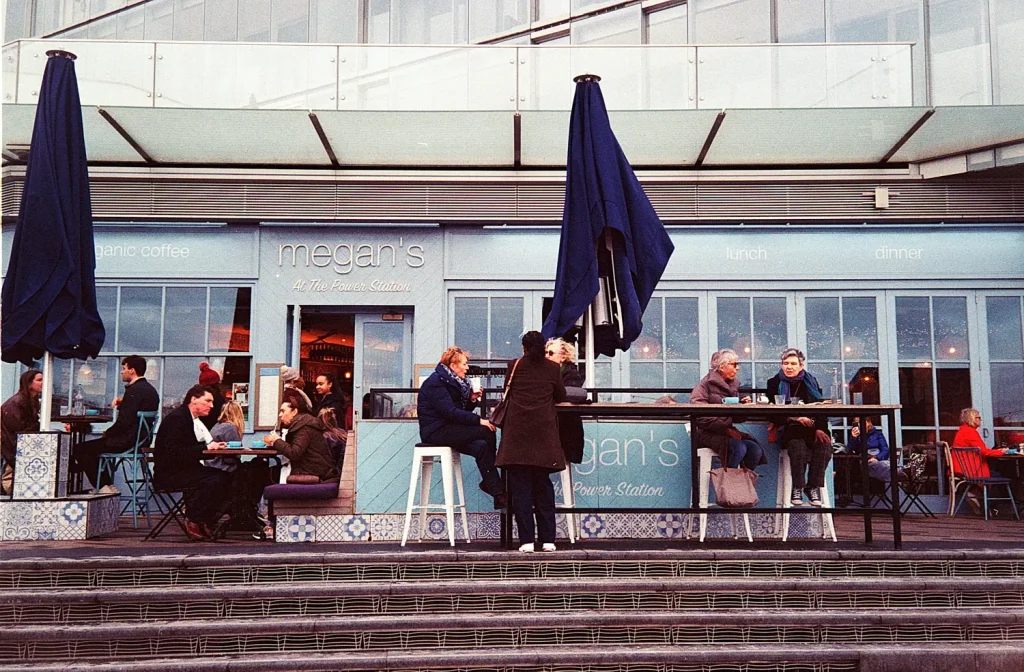 customers eating outside at a restaurant at Battersea Power Station