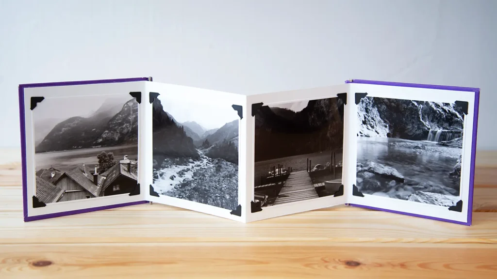 four prints in a book