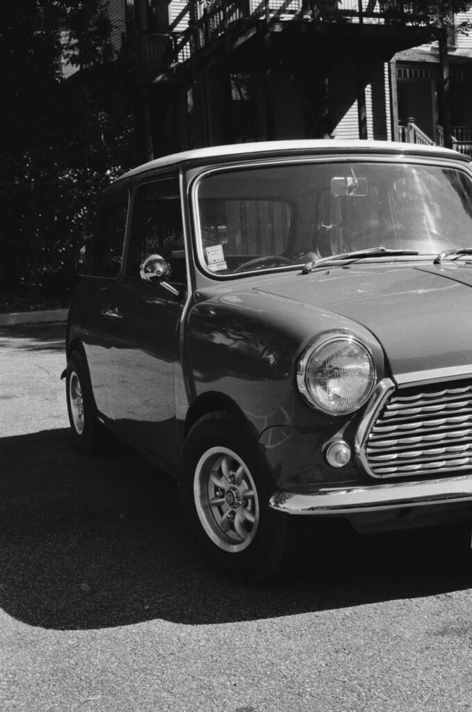 black and white image of a vintage car taken on double x film