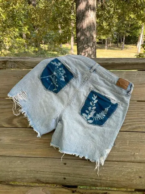 cyanotype printing on a pair of jean shorts