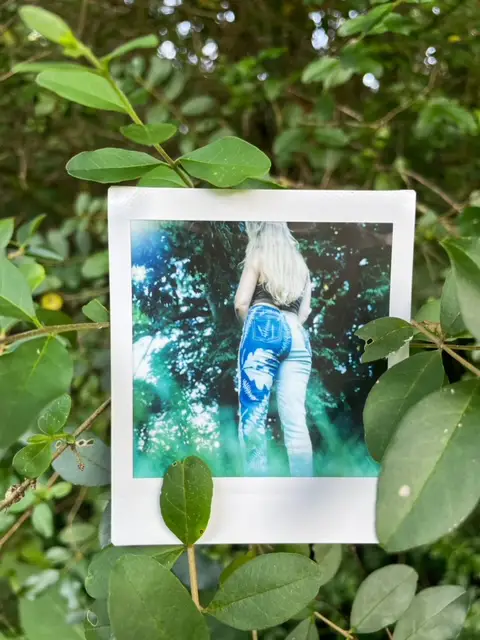 instant film picture of cyanotype jeans