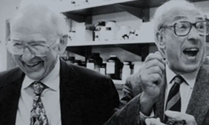 A picture of two elderly, smiling gentlemen. Dr. Edwin Krebs on the left and Dr. Edmond Fischer on the right 
