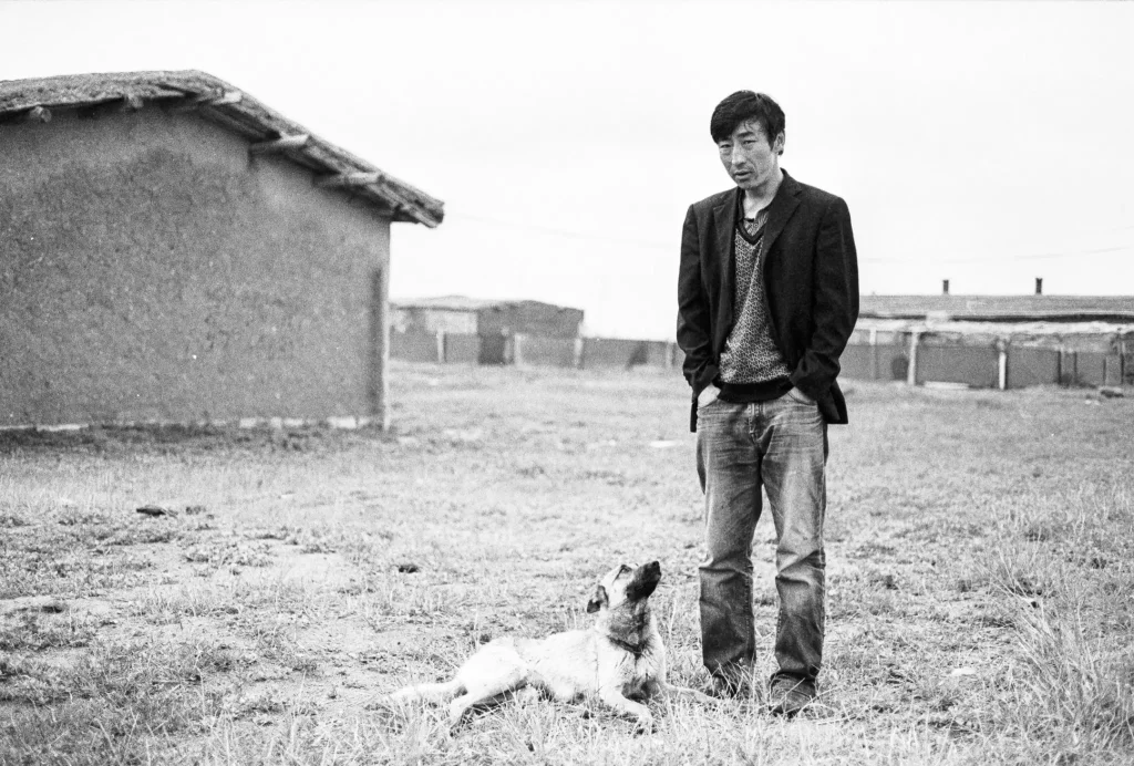 Man with dog in Mongolia